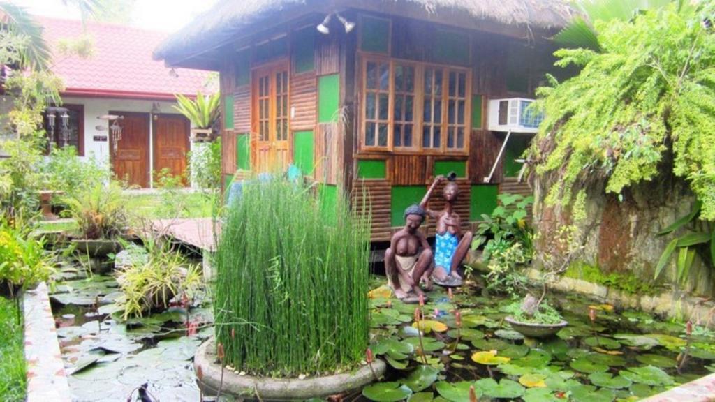 The Lotus Garden Bed and Breakfast Puerto Princesa Buitenkant foto