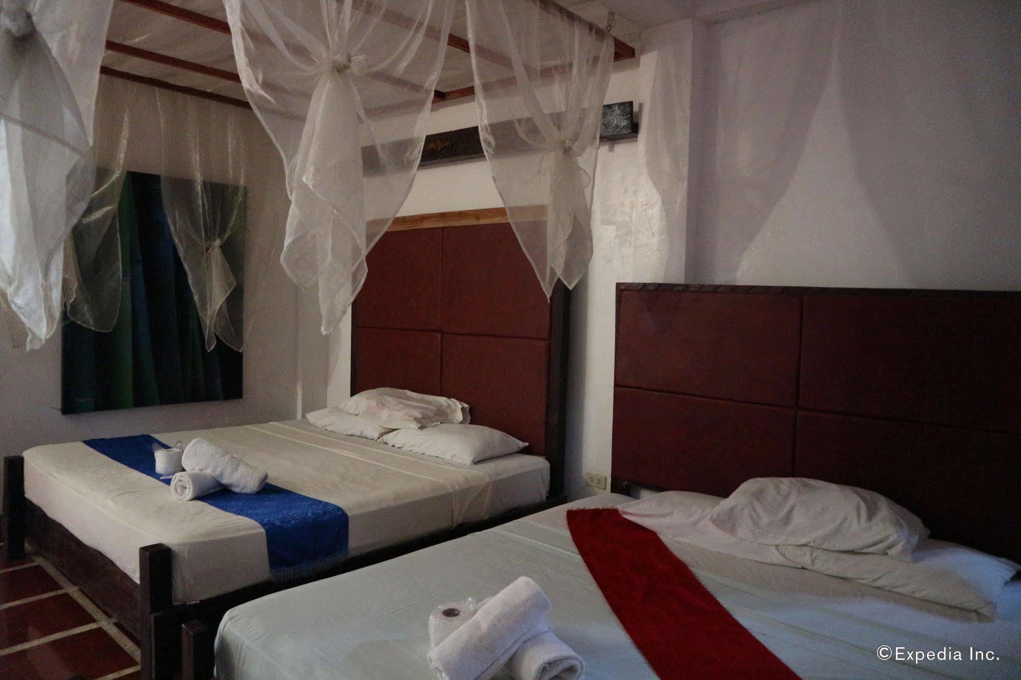 The Lotus Garden Bed and Breakfast Puerto Princesa Buitenkant foto